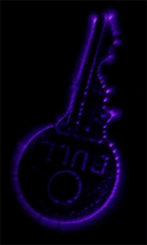 Kirlian photography of a key (AC flyback)